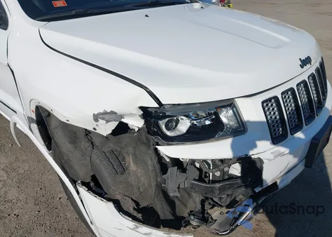 2015 Jeep Grand Cherokee Altitude z USA, uszkodzony, nr VIN 1C4RJFAG7FC877174